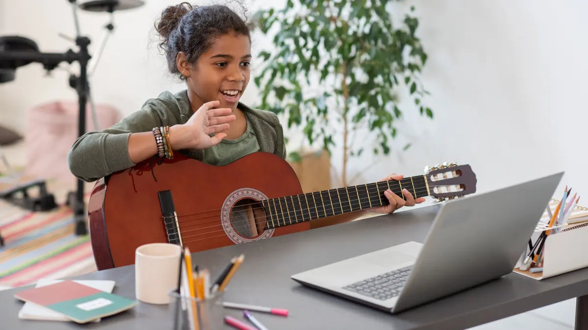 Unleashing the Power of Online Guitar Lessons for Kids