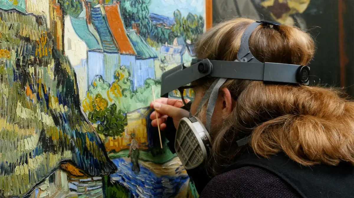 What does an art conservator do