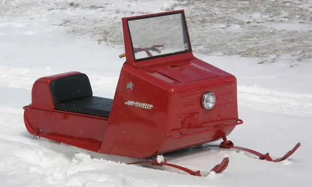 Carving a timeline of snowmobile history