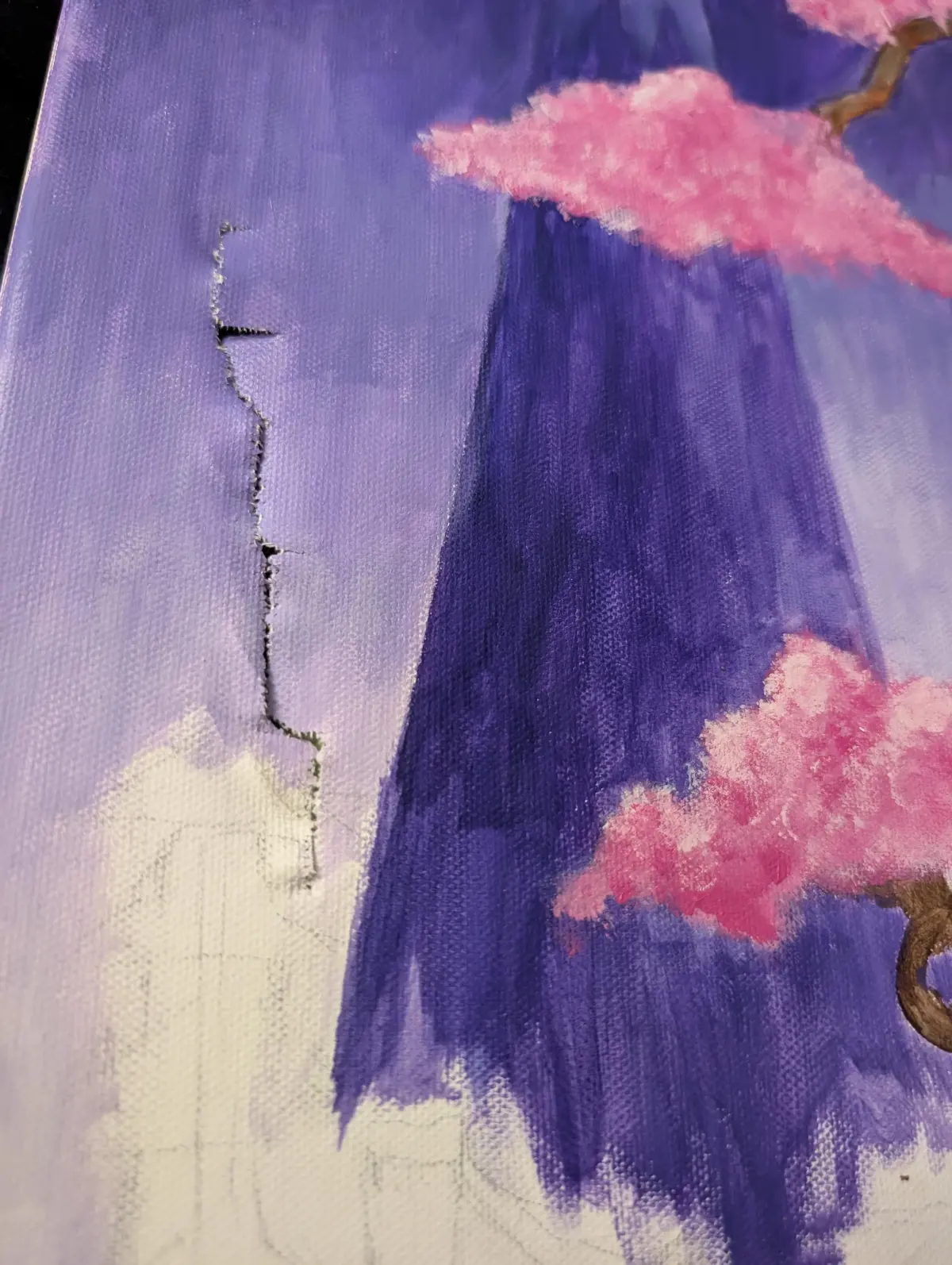 Anyone know how to fix a ripped stretched canvas?